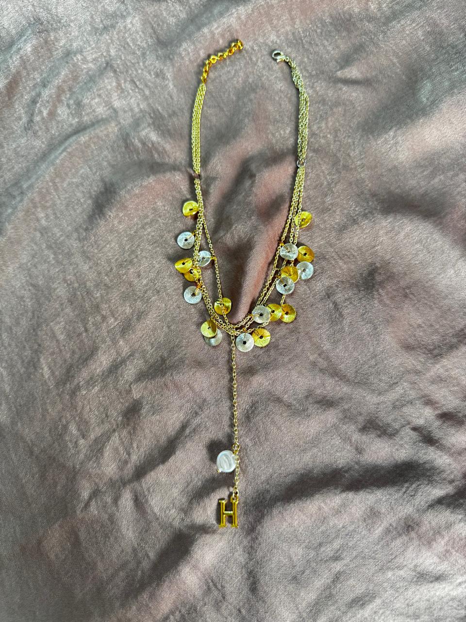 Initital neckpiece