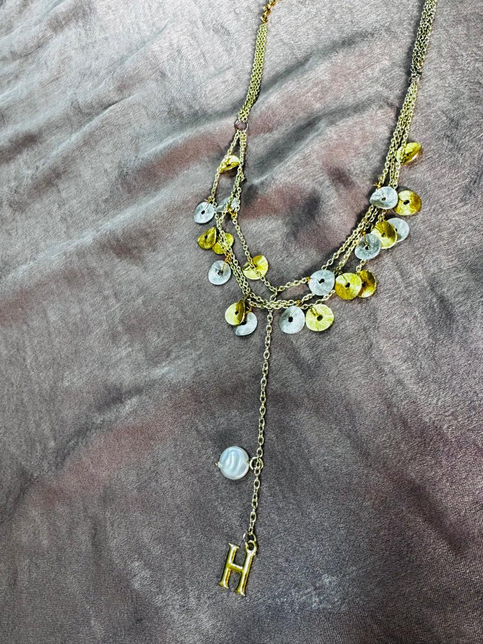 Initital neckpiece