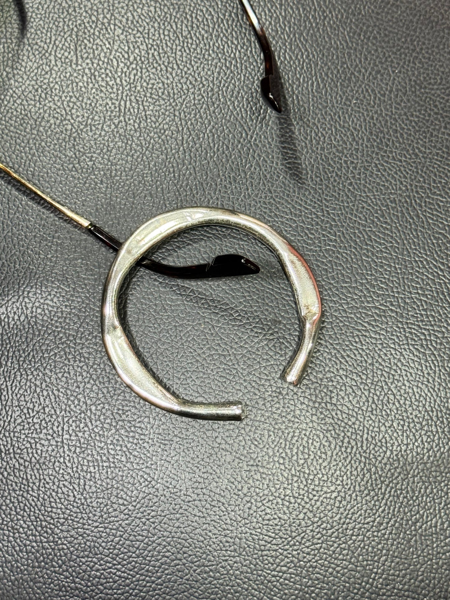 Silver polish Twisted Bangle