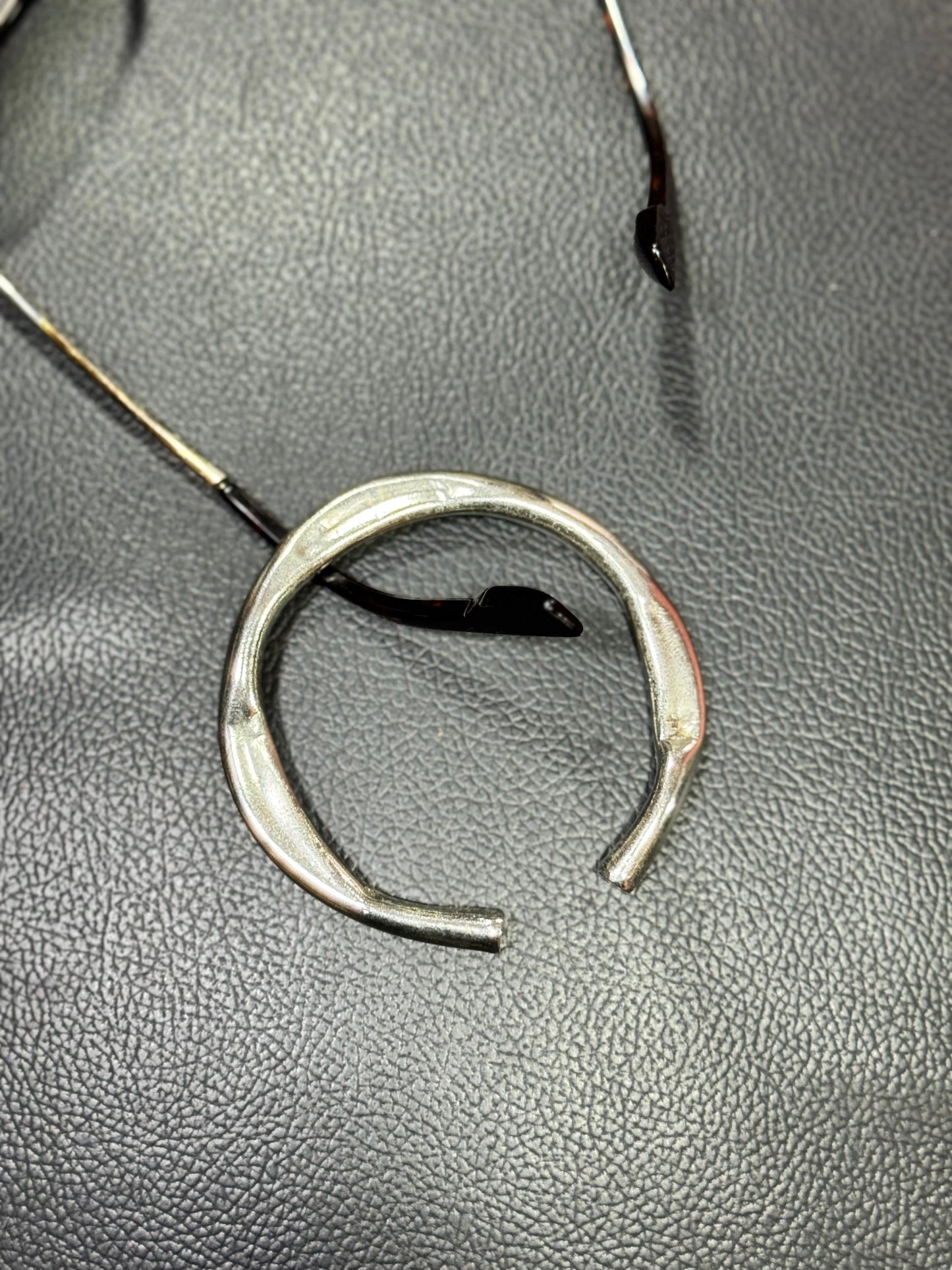 Silver polish Twisted Bangle