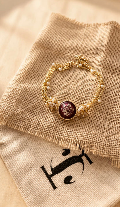 Burgundy Floral Medallion with Delicate Gold Chains