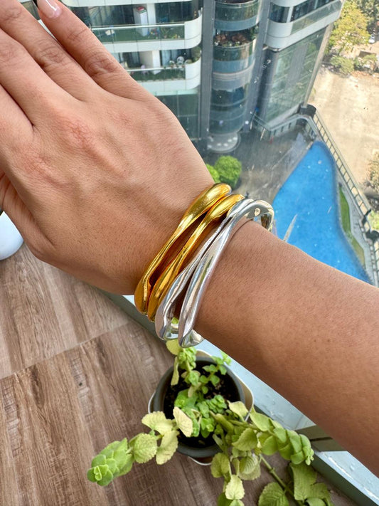 Silver polish Twisted Bangle